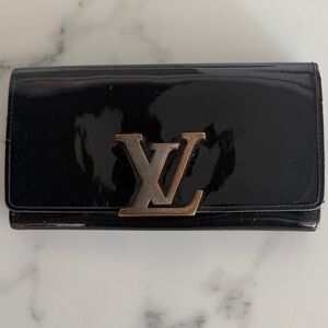 Louis Vuitton Shiny Black Wallet with Gold Emblem